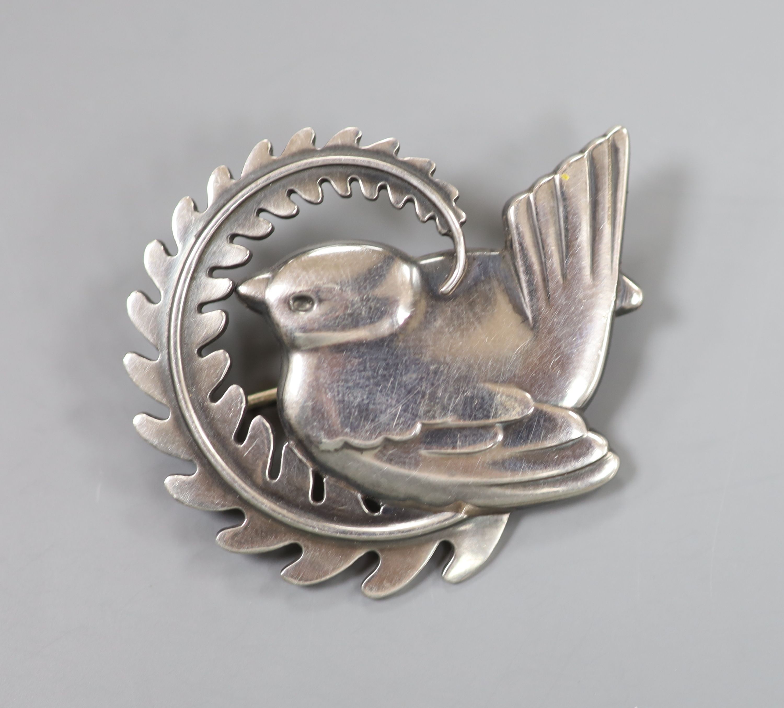 A Georg Jensen sterling robin and frond brooch, no. 309, 46mm.